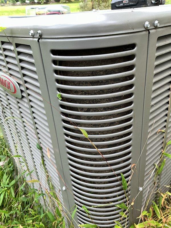 Responded to service call for outdoor HVAC unit electrical protection. Installed surge protector to safeguard the condensing unit's electrical components and control board from voltage spikes and power surges. Connected surge protection device to unit's electrical system, properly routing and securing all wiring connections with appropriate fasteners. Tested system operation to verify proper installation and confirm unit functionality following surge protector integration.