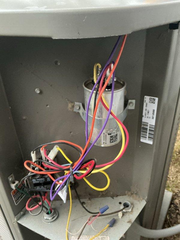 Completed MVP air conditioning maintenance on residential cooling system. Performed comprehensive inspection of outdoor condensing unit, accessing electrical panel to examine capacitor, contactor, and associated wiring connections. All electrical components showed normal wear with secure wire terminations. Inspected indoor Lennox furnace and air handler system in basement, noting proper operation of blower assembly and ventilation components. Observed heavy condensation on metallic supply ductwork, indicating system is cooling effectively. Verified refrigerant lines, condensate drainage system, and PVC drain lines for proper function. System operating within normal parameters with no immediate service needs identified.