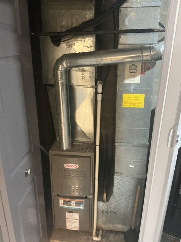 Completed installation of new residential HVAC system including Lennox furnace, air handler unit, and outdoor condensing unit. Installed and connected all refrigerant lines with proper insulation, mounted outdoor unit on vibration-dampening pad with gravel surround, and routed metal ductwork from furnace through ceiling joists. All electrical connections, PVC condensate drainage, and service valves installed per manufacturer specifications, with system ready for virtual inspection approval.