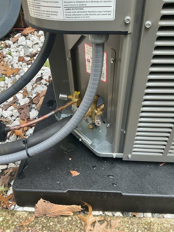 Completed installation of new residential HVAC system including Lennox furnace, air handler unit, and outdoor condensing unit. Installed and connected all refrigerant lines with proper insulation, mounted outdoor unit on vibration-dampening pad with gravel surround, and routed metal ductwork from furnace through ceiling joists. All electrical connections, PVC condensate drainage, and service valves installed per manufacturer specifications, with system ready for virtual inspection approval.