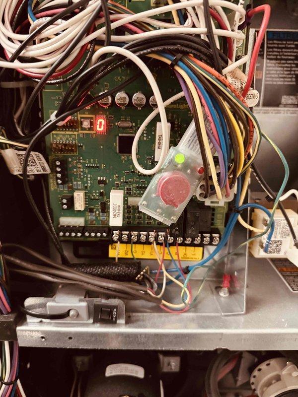 Completed MVP heating maintenance on gas furnace system. Performed comprehensive system inspection including control board diagnostics and combustion analysis. Verified all electrical connections and wiring at control panel, inspected circuit board components and LED indicators showing proper operation. Conducted combustion efficiency testing using calibrated analyzer, confirming optimal performance with readings of 96.1% efficiency, 27 ppm CO, 6.1% CO₂, and 97°F stack temperature. All parameters within manufacturer specifications for natural gas operation. System operating safely and efficiently.