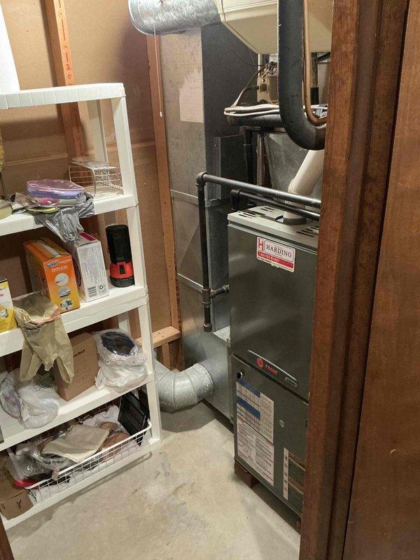 Conducted on-site assessment for stand-alone dehumidifier installation in unfinished basement utility area with existing HVAC equipment. Evaluated space conditions, structural considerations, and optimal placement for dehumidifier unit to address indoor air quality concerns in below-grade living space.