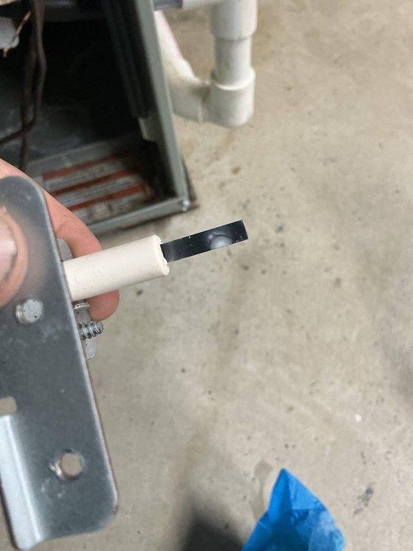 Completed MVP furnace maintenance on residential heating system. Performed comprehensive system inspection and diagnostics using digital multimeter to verify proper electrical readings and system performance. Measured and documented amperage draw at 8.109 amps, confirming unit is operating within manufacturer specifications. Inspected pressure switch assembly, including tubing connections and diaphragm components, ensuring proper operation for safe furnace cycling. Examined gas valve, burner assembly, and ignition components for proper function. Verified all wiring connections, including control board circuits and safety switches. Checked condensate drainage system including PVC piping and trap assembly. All components found to be functioning correctly with no immediate repairs required. System tested and left in proper working order.
