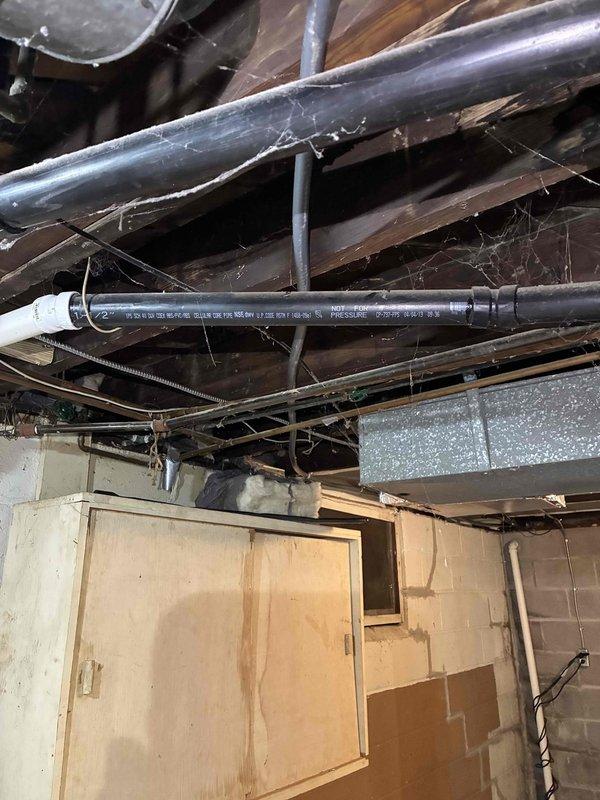 Responded to service call regarding flickering lights in residence. Performed comprehensive electrical panel inspection and diagnosed wiring issues requiring attention. Inspected basement electrical infrastructure including exposed conduit runs and junction boxes, identifying areas with aged wiring and connections contributing to the flickering condition. Verified proper grounding at exterior meter base and evaluated service entrance conductors for integrity. Addressed electrical deficiencies found during panel inspection, secured all connections, and confirmed proper circuit loading to resolve flickering issue and ensure safe, reliable operation of the electrical system.