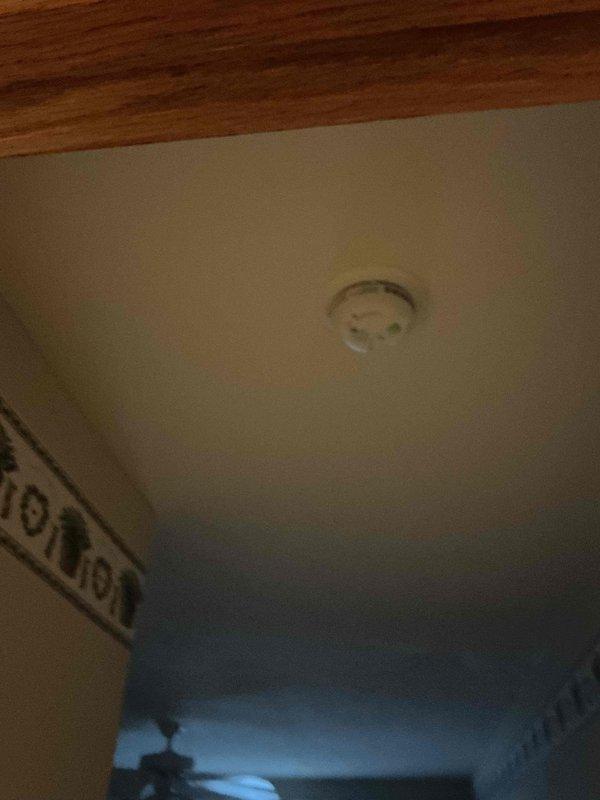 Replaced three customer-supplied smoke detectors in bedroom locations. All units were successfully installed and tested for proper operation, with indicator lights confirming functionality upon completion.