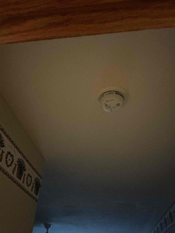 Replaced three customer-supplied smoke detectors in bedroom locations. All units were successfully installed and tested for proper operation, with indicator lights confirming functionality upon completion.