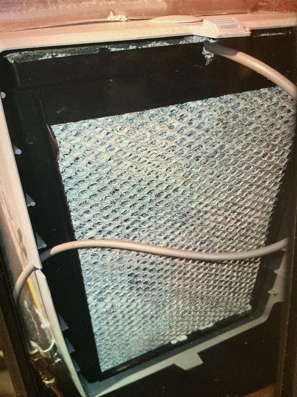 Performed scheduled heating maintenance on a 3-year-old gas furnace system. Inspected air filter showing normal wear and verified proper installation within the air handler unit. Examined evaporator coil fins, noting dust accumulation and minor discoloration on surfaces, which is typical for equipment of this age and does not require immediate intervention at this time.