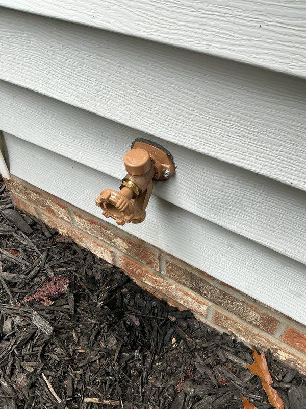 Replaced two 30-year-old exterior hose bibs with new Woodford frost-free sillcocks, including installation of Webstone shut-off valves, copper pipe connections, and necessary fittings. One fixture was located in the garage area with copper piping routed through the attic space with proper insulation clearance, and the second was installed at the front corner of the house above the brick foundation through the vinyl siding. All connections were secured and tested for proper operation and leak-free performance.