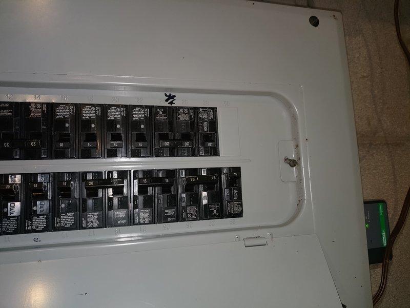 Replaced existing can light fixture above back bedroom shower with new 6" LED wafer light, removing old bracket as needed for proper installation. Installed new dedicated 20-amp circuit from main electrical panel to water softener location, terminating in properly grounded outlet to eliminate unsafe extension cord usage and provide code-compliant power supply for equipment.