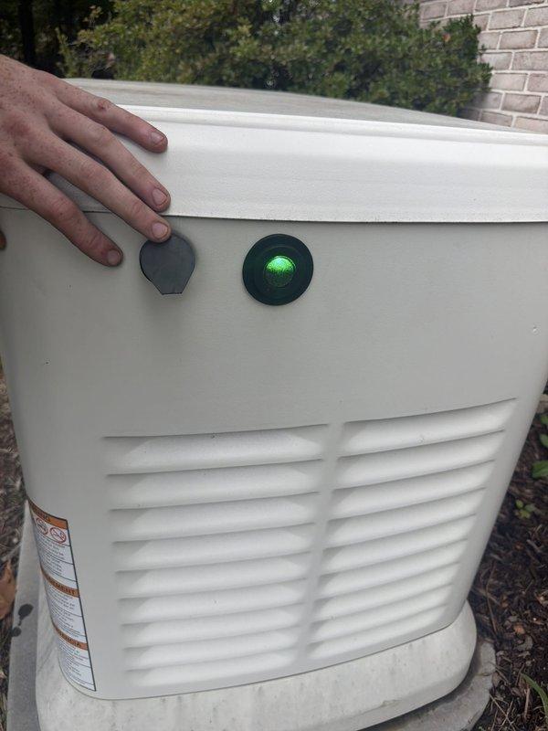 Performed scheduled preventative maintenance on 26KW standby generator. Replaced air filter and oil filter per manufacturer specifications. Inspected unit operation, verified green indicator light showing system ready status, and confirmed all safety controls functioning properly.