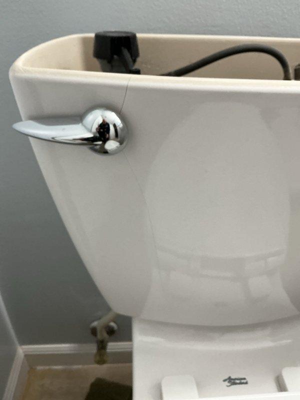 Responded to first-time service call for toilet replacement evaluation. Assessed existing white ceramic toilet with standard flush mechanism, noting internal tank components including fill valve and flush valve assembly in working condition. Provided on-site consultation and prepared replacement quote for basic American standard toilet installation. Scheduled weekend appointment per customer availability, with service call fee to be applied toward approved replacement work.