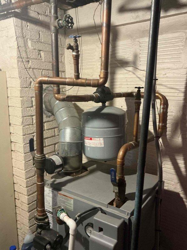 Completed routine maintenance on 13-year-old Utica boiler model UH1B120FE. Performed standard tune-up procedures including inspection of all system components, burner assembly cleaning, heat exchanger examination, and verification of proper operation of expansion tank, circulator pump, and associated valves and piping connections.