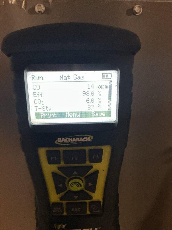 Completed MVP recurring heating maintenance visit. Performed combustion analysis on natural gas heating equipment, recording optimal readings of 14 ppm CO, 98.0% efficiency, 6.0% CO₂, and 87°F stack temperature using calibrated diagnostic equipment. Inspected Bradford White water heater with Defender Safety System, verified proper operation of connected expansion tank and plumbing components, and confirmed all mechanical systems functioning within manufacturer specifications.
