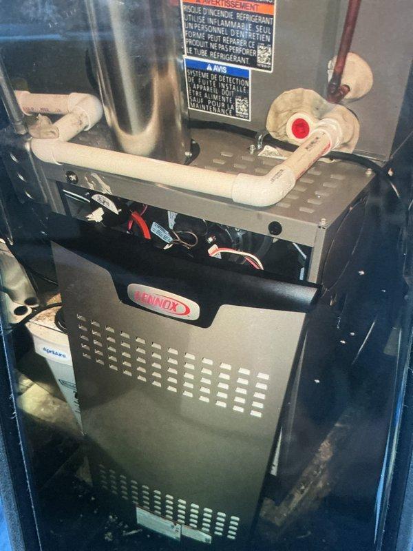 Responded to service call for 18-day-old Lennox furnace with door closure issue. Upon inspection, confirmed defective door latch pin preventing proper access panel securing. Removed faulty pin hardware and installed replacement door latch assembly to manufacturer specifications. Verified door now closes and latches securely, ensuring proper unit operation and safety interlock function. Unit tested and returned to normal service.