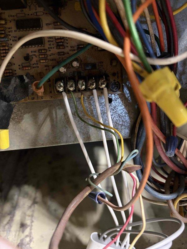 Completed installation of 80% AFUE furnace unit in garage utility area. Installed air handler with proper electrical connections, condensate drain line, flexible metal conduit, and gas supply piping. Verified all wiring terminations at control board and terminal strip, ensuring proper color-coded connections for thermostat control, power supply, and safety circuits. Unit mounted securely against insulated wall with all required clearances maintained for safe operation and future serviceability.
