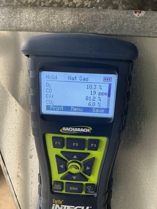 Completed MVP heating maintenance visit and performed comprehensive system diagnostics. Conducted combustion analysis on natural gas heating equipment, recording oxygen levels at 10.3%, carbon monoxide at 19 ppm, efficiency at 81.2%, and carbon dioxide at 6.0%. Also measured temperature differential at -0.39° to verify proper system operation and airflow performance.