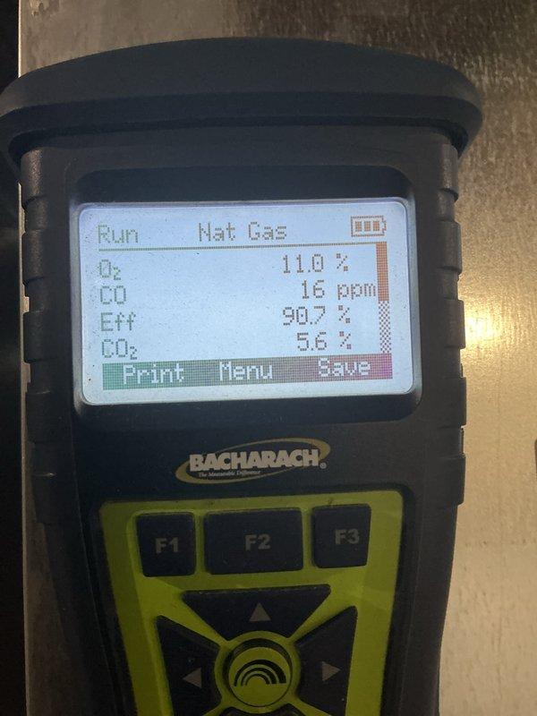 Completed comprehensive furnace tune-up and performance verification. Conducted combustion analysis using calibrated gas detection equipment, confirming optimal system operation with oxygen level at 11.0%, carbon monoxide at 16 ppm, efficiency at 90.7%, and carbon dioxide at 5.6%. Inspected integrated control board and verified all electrical connections, wire harnesses, and safety circuits are secure and functioning properly. All components operating within manufacturer specifications.