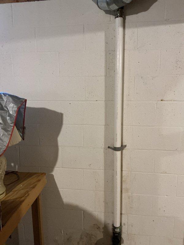 Responded to report of cracked PVC drain line beneath kitchen sink causing periodic leakage of contaminated water into basement area. Upon inspection, identified deteriorated vertical drainage pipe with visible cracking along the run. Replaced damaged section of PVC drainage pipe, ensuring proper alignment and secure mounting to wall with appropriate brackets. Tested system for leaks and verified proper drainage flow upon completion.