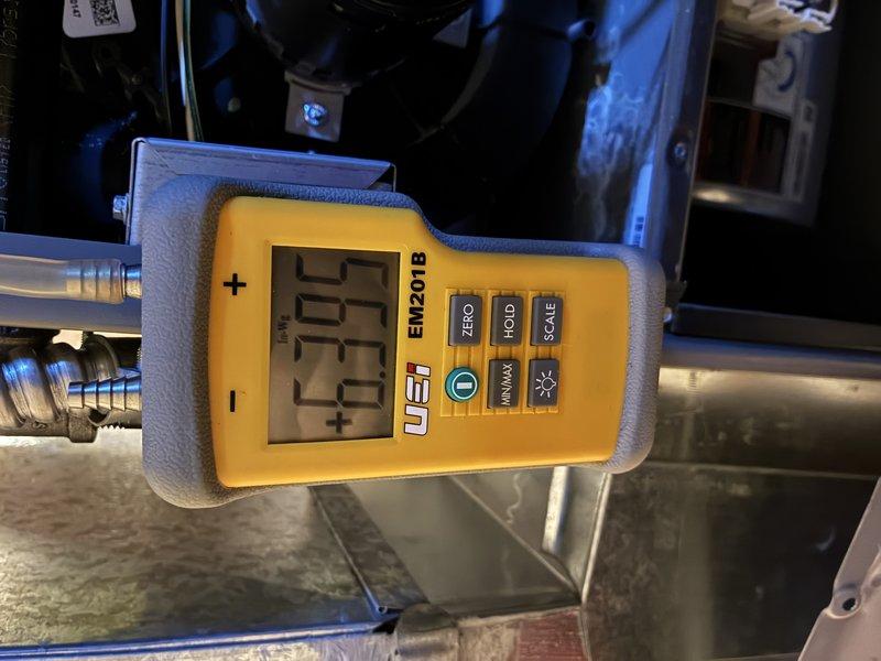 Completed comprehensive heating system maintenance under the Maintenance MVP program. Performed diagnostic testing using calibrated digital measuring equipment to verify system performance and operational parameters. Inspected ductwork system including interior insulation integrity and plenum components, confirming proper installation and condition of foil-faced insulation material throughout accessible sections.