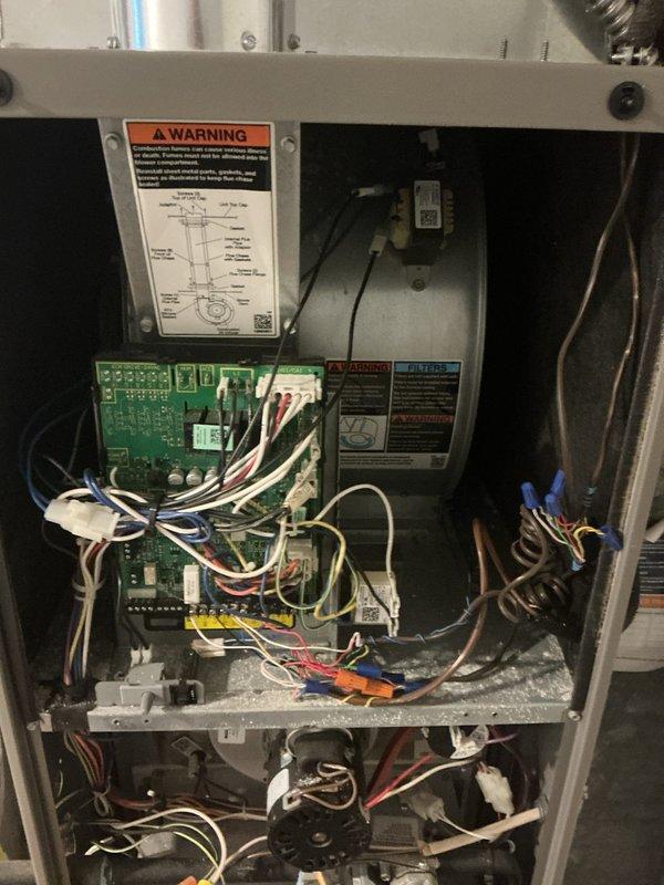 Performed comprehensive furnace tune-up and safety inspection. Accessed control panel to examine PCR board, verified all electrical connections and wire terminations, and inspected internal components for proper operation. Cleaned accumulated debris from blower compartment and surrounding areas to ensure optimal airflow and system efficiency.