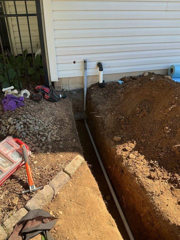 Installed GFCI-protected electrical circuit for pool pump by hand-digging trench approximately 7-10 feet alongside foundation and deck structure. Installed copper bonding ring around pool perimeter with inline skimmer bond connection and proper pump bonding per NEC requirements. Set electrical post for pump disconnect, ran conduit and wiring through excavated trench, and completed all grounding and bonding connections to ensure safe pool electrical system operation.