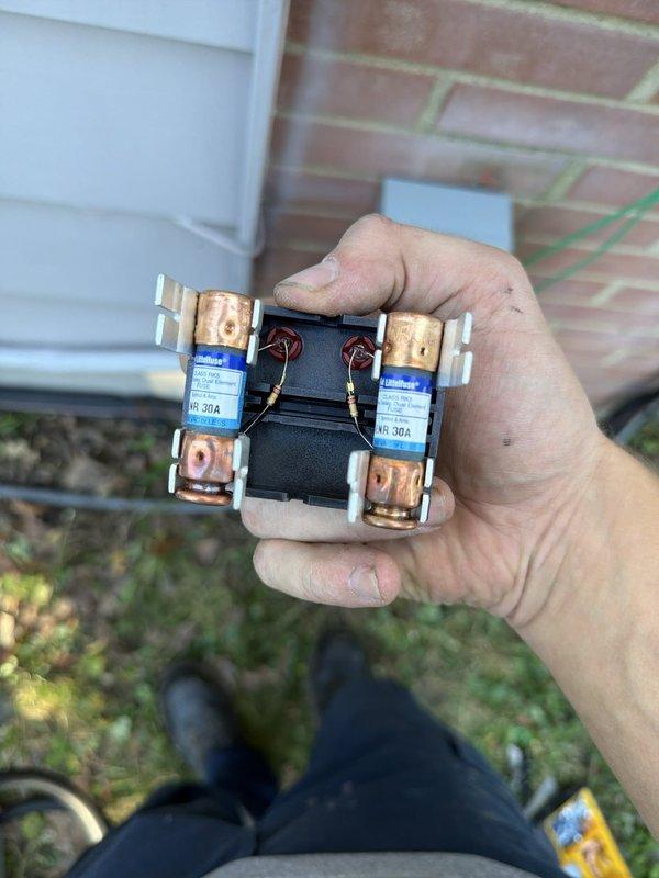 Completed second-phase air conditioning installation including coil installation and electrical connections. Installed new contactor with 30-amp rating and connected all low-voltage and line-voltage wiring to system components. Wired thermostat connections, capacitor, and control circuits using proper wire nuts and terminations, ensuring all electrical connections meet code requirements for safe operation of the new AC system.