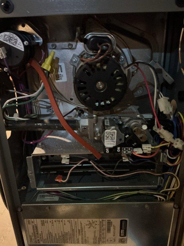 Completed comprehensive heating maintenance on residential furnace system. Performed visual inspection of all internal components including blower motor assembly, gas valve, heat exchanger, burner assembly, electrical connections, and control board. Verified proper operation of blower motor, checked all wire connections and harnesses for security and signs of wear, and inspected burner compartment components. All mechanical and electrical systems found to be in proper working order with no immediate service needs identified.