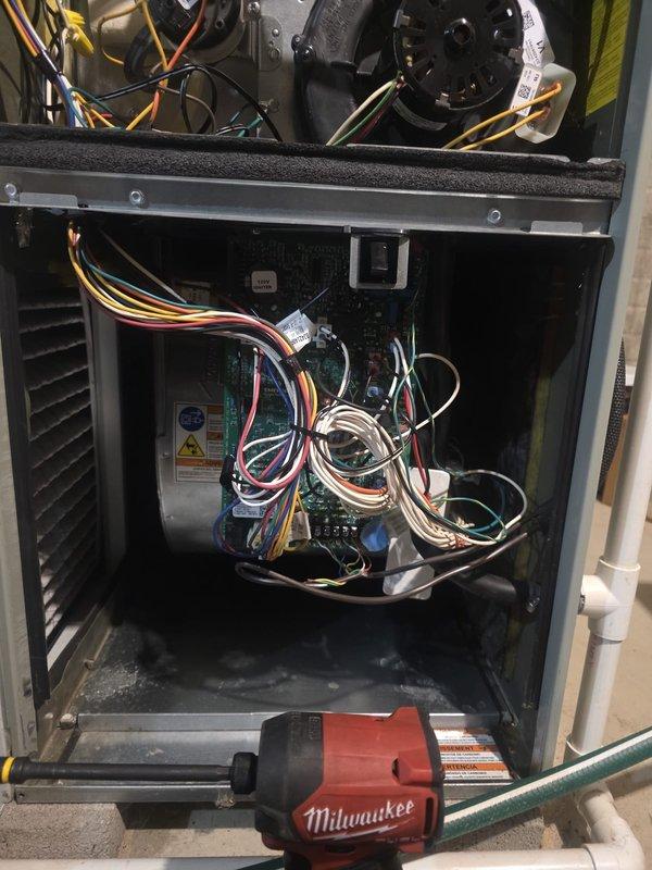 Completed comprehensive heating maintenance on residential furnace system. Performed thorough inspection of blower motor assembly, verified proper operation of blower wheel housing, and checked all electrical connections throughout the unit. Examined circuit board and wiring harnesses for signs of wear or damage, confirmed all wire terminations were secure. Inspected PVC venting system for proper drainage and structural integrity. All components found to be operating within manufacturer specifications and unit returned to normal service.
