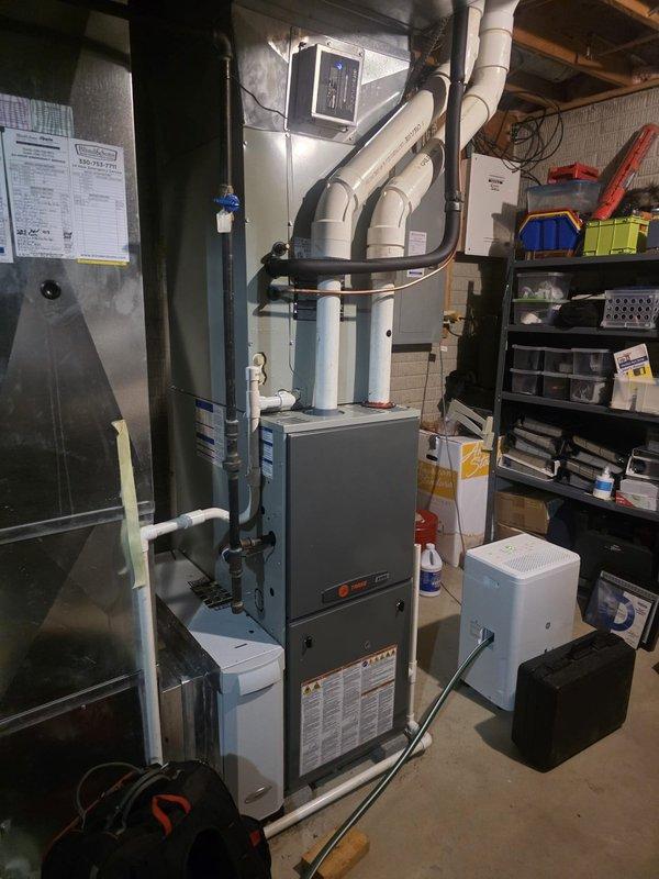 Completed comprehensive heating maintenance on residential furnace system. Performed thorough inspection of blower motor assembly, verified proper operation of blower wheel housing, and checked all electrical connections throughout the unit. Examined circuit board and wiring harnesses for signs of wear or damage, confirmed all wire terminations were secure. Inspected PVC venting system for proper drainage and structural integrity. All components found to be operating within manufacturer specifications and unit returned to normal service.