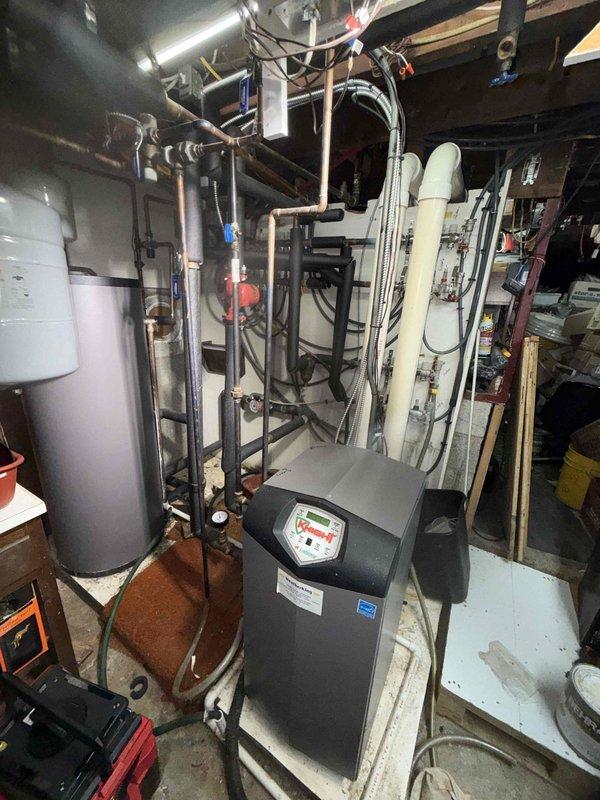 Completed scheduled BS-MVP heating maintenance visit on 17-year-old hydronic boiler system with radiator heat distribution. Performed comprehensive inspection of boiler unit, verified temperature and pressure gauge readings within normal operating parameters, examined all visible piping connections and components for leaks or deterioration, and assessed overall system performance. Unit operating properly with no immediate concerns identified at time of service.