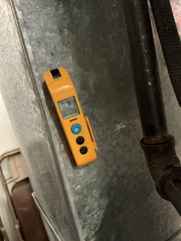 Completed comprehensive MVP Heat maintenance service on heating system. Inspected and documented air filter condition, noting moderate dust accumulation and discoloration across filter media within air handler unit. Performed diagnostic measurements using digital testing equipment on HVAC components to verify proper system operation and performance parameters.