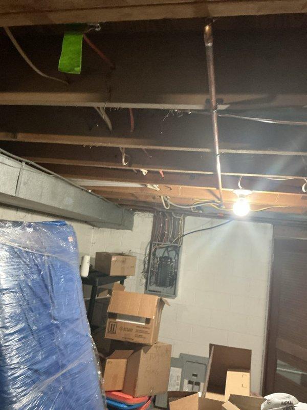 Installed dedicated electrical circuit for electric water heater in basement utility area. Ran new wiring through exposed ceiling joists, terminated connections at water heater location, and verified proper operation of circuit. All work completed per code requirements with appropriate wire sizing for tank specifications.