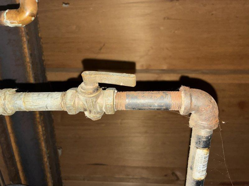 Responded to no-heat call where furnace blower motor failed to activate. Upon inspection, diagnosed blower motor failure and assessed control board connections and gas valve assembly. Documented existing system conditions including aged plumbing infrastructure and internal furnace components showing signs of wear and corrosion for customer review and repair recommendations.