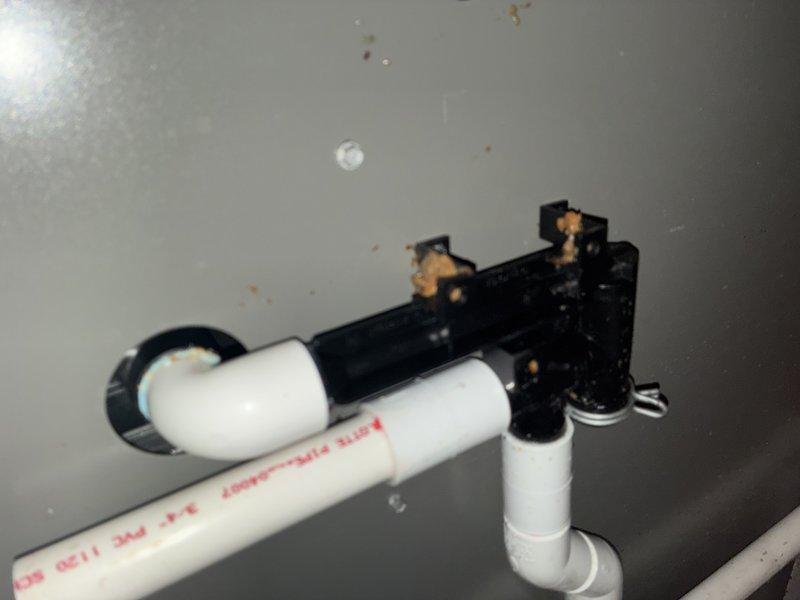 Responded to no-heat call on 2-year-old Lennox furnace with water leaking from base. Upon inspection, found condensate drain line completely blocked, causing water to back up and overflow from furnace. High-efficiency furnace safety controls had shut down unit to prevent damage. Cleared drain line obstruction, verified proper drainage flow through PVC condensate system, tested furnace operation through complete heating cycle, and confirmed unit returned to normal function with no further water accumulation.