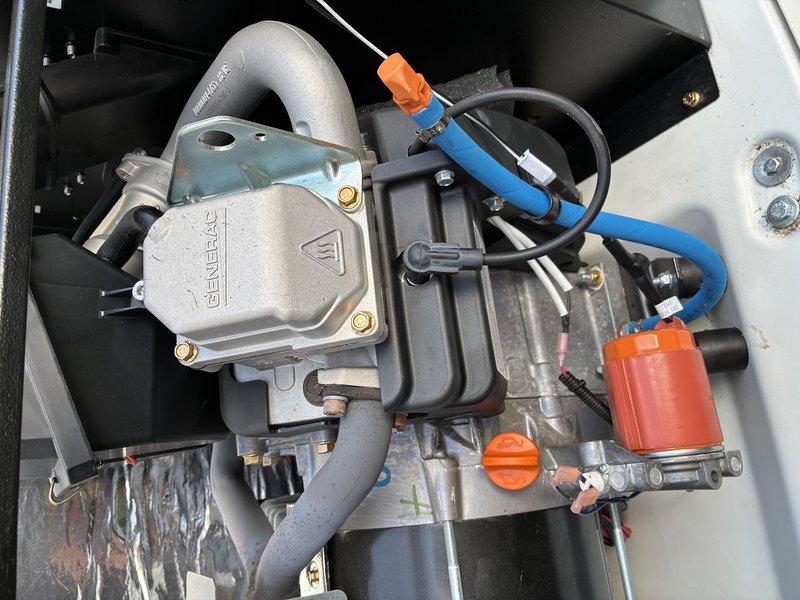 Performed scheduled annual maintenance on one-year-old Generac generator unit as included with original installation. Inspected control panel display and operational indicators, verified all electrical connections and wiring harnesses, examined engine components including ignition system and fuel lines, and confirmed proper mounting and housing integrity. All systems tested and found operating within manufacturer specifications.