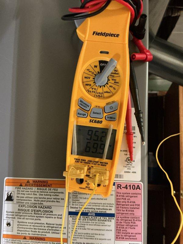 Completed comprehensive furnace maintenance on MVP heating system. Performed diagnostic testing using Fieldpiece dual port manometer to measure temperature differentials and system pressures, recording inlet temperature of 118.2°F and ambient temperature of 75.2°F. Utilized Fieldpiece SC680 clamp meter to verify electrical parameters including voltage, amperage, and resistance across motor and blower assembly. Inspected internal components including blower motor, heat exchanger, wiring harnesses, and gas valve connections. Verified proper operation of all mechanical and electrical systems, confirmed R-410A refrigerant labeling and safety warnings are present and legible. All components functioning within manufacturer specifications, no repairs required at this time.