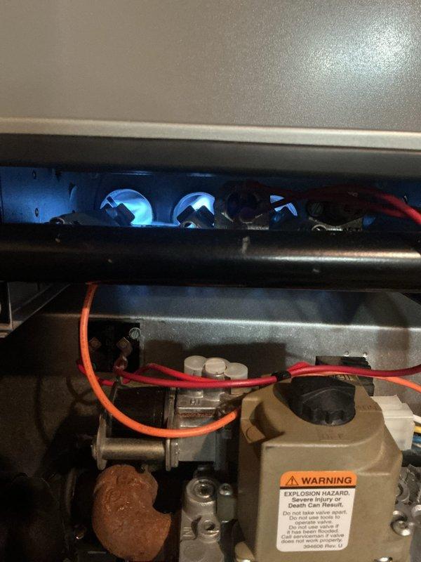 Completed scheduled MVP heating maintenance visit. Performed comprehensive inspection of gas furnace system, verifying proper operation of burner assembly with all three burners igniting and producing proper blue flames. Examined gas valve assembly, electrical connections, and safety controls including limit switches and flame sensor. Inspected venting system including PVC intake and exhaust piping, confirmed proper installation and secure connections. Verified gas line connections for leaks, checked all wiring terminations, and ensured access panels were properly secured upon completion. System operating within manufacturer specifications with no deficiencies noted.