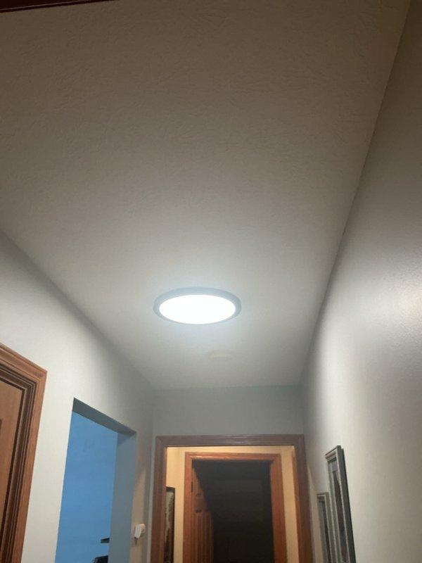 Responded to lightning strike damage affecting multiple light fixtures throughout the residence. Replaced damaged recessed light fixture in bedroom, installed new closet light fixture, and replaced rear deck floodlight. All fixtures tested and verified operational upon completion of installation.