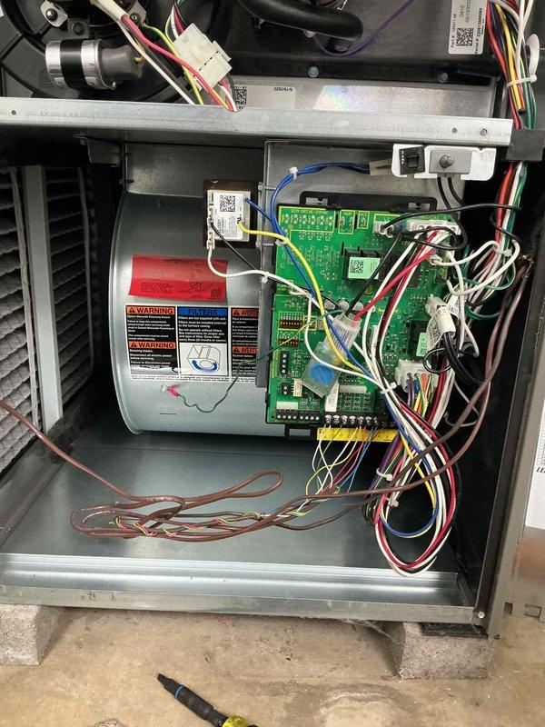 Completed routine maintenance on a 2-year-old gas furnace. Accessed control cabinet, inspected internal components including control board and blower motor assembly, verified all electrical connections and wiring harnesses were secure, and referenced manufacturer specifications for proper venting configuration to ensure system compliance with installation requirements.