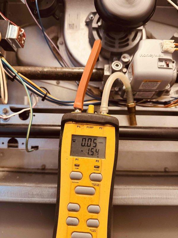 Responded to service call for 3-year-old natural gas furnace experiencing intermittent heating issues where unit would initiate but fail to produce heat. Performed diagnostic testing using digital manometer to measure gas pressure and verify proper readings at inlet and manifold. Inspected burner assembly, heat exchanger, and ignition system components. Checked all electrical connections and verified proper voltage to gas valve and control board. System tested and confirmed operational with proper heat output restored.