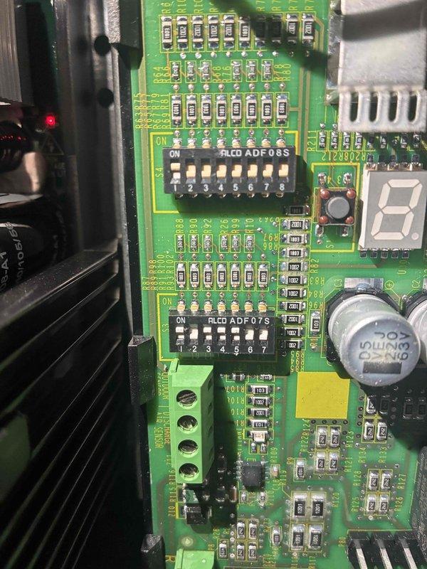 Completed MVP Cooling Maintenance on HVAC system. Performed thorough inspection of evaporator coil assembly, noting normal condensation on drain pan and minor dust accumulation on aluminum fins. Examined control board components including DIP switches, circuit connections, and LED display showing proper operational status. All system components found to be functioning within normal parameters.