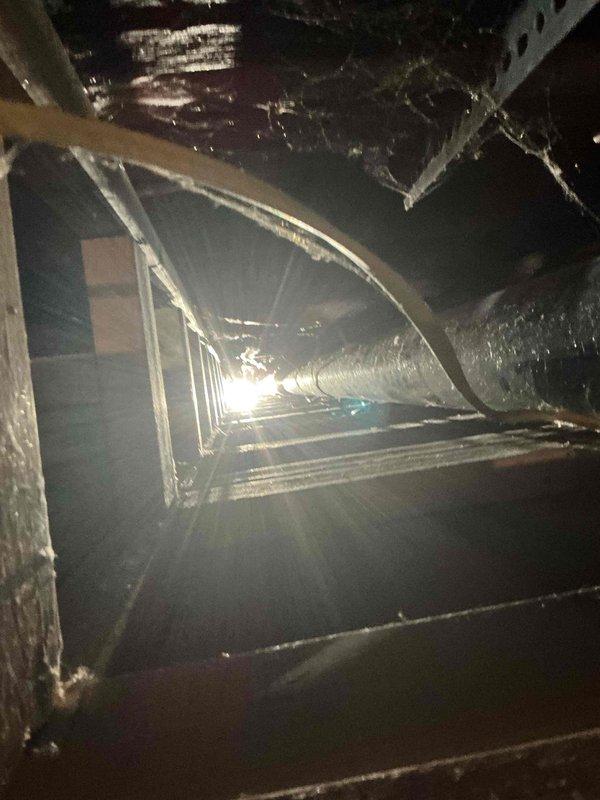Conducted comprehensive electrical estimate for generator installation at residential property. Performed thorough site assessment of attic space and existing electrical infrastructure, documenting current conditions including HVAC ductwork routing, insulation placement, and available clearances for potential generator transfer switch and associated wiring pathways. Photographed structural framing, existing flexible duct installations, and electrical access points to develop accurate scope of work for whole-house generator system integration with main electrical panel.