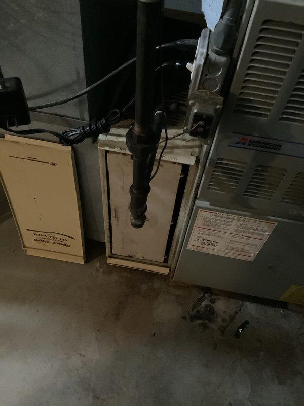 Responded to no heat call and performed comprehensive evaluation of existing Lancaster furnace system in residential basement. Upon inspection, determined unit had reached end of serviceable life and was no longer economically repairable. Documented existing HVAC infrastructure including air handler, humidifier unit, ductwork connections, condensate drainage system, and associated plumbing components. Provided detailed estimate for complete furnace replacement including removal of existing equipment, installation of new high-efficiency heating system, integration with current ductwork and humidifier, proper venting and condensate line connections, and electrical hookups to meet current code requirements.
