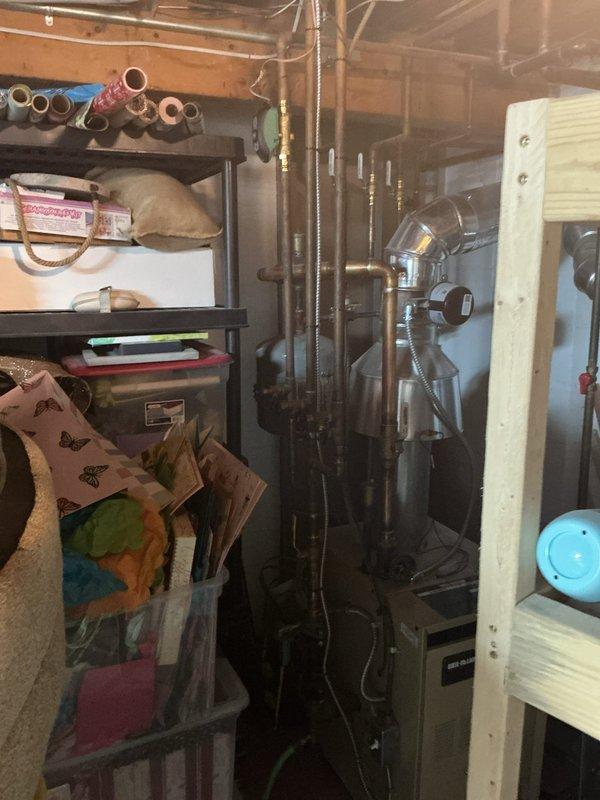 Performed second opinion inspection on a six-year-old steam gas boiler system and identified multiple critical failures requiring attention. Found failed backflow preventer, expansion tank with multiple holes causing system leaks, and temperature and pressure relief valve opening due to mineral buildup. Additionally confirmed boiler piping configuration does not meet proper installation standards and requires correction to ensure safe and efficient operation.