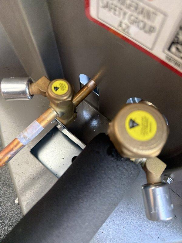 Completed installation of a 90% efficiency furnace and air conditioning system. Installed new valve assemblies with copper tubing connections, filters, and electrical components including relay contactors with proper wiring terminations. All equipment mounted securely within cabinet enclosure and system tested for proper operation.