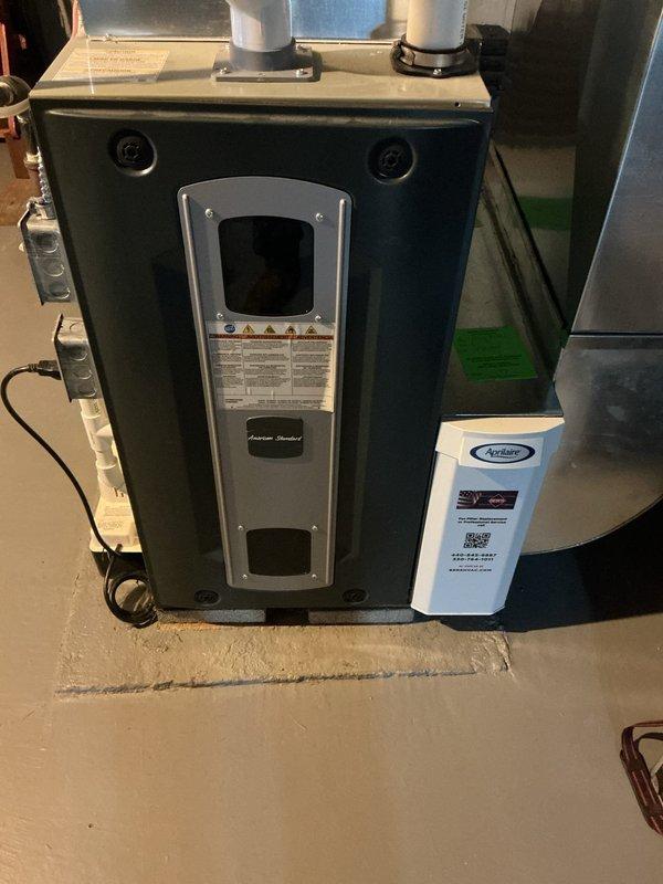 Completed comprehensive MVP heating maintenance on a 5-year-old American Standard furnace located in basement. Performed standard inspection procedures including visual examination of unit components, exhaust venting system, electrical connections, and thermostat wiring. All systems found to be operating within normal parameters with no immediate service needs identified at this time.