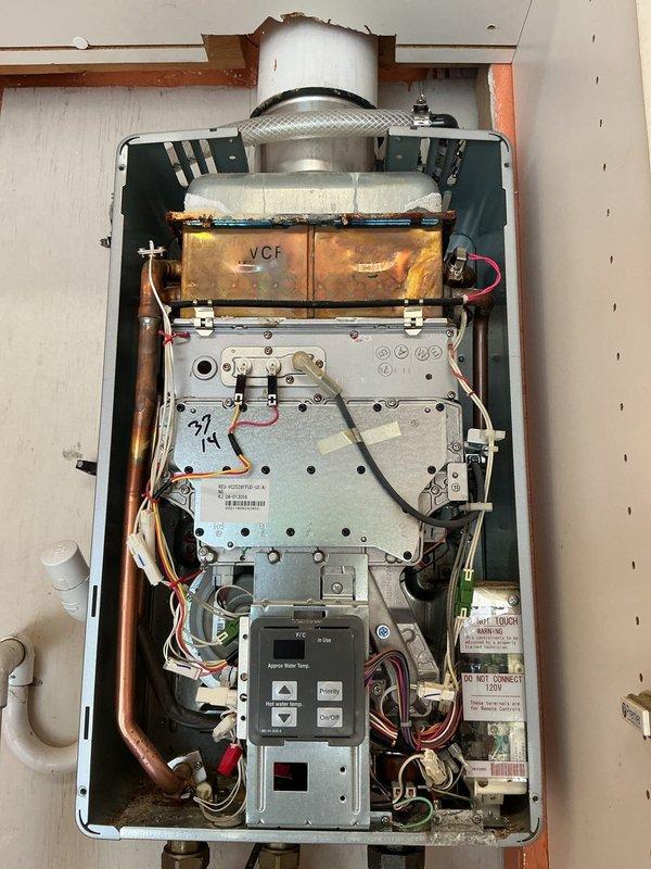 Responded to emergency gas leak at Rinnai tankless water heater in garage where gas company had shut off service at the meter. Accessed and inspected the unit, identifying a leaking gas fitting connection. Tightened the faulty fitting, performed pressure test to verify repair integrity, and confirmed no additional leaks were present. Restored gas service and tested water heater operation to ensure proper function and safety.