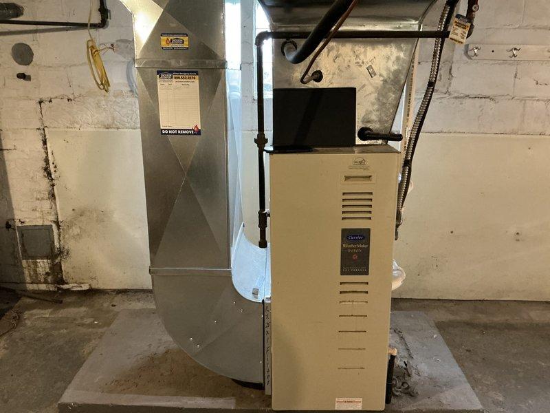 Conducted comprehensive estimate for complete furnace and air conditioning system replacement at residential property. Evaluated existing basement HVAC installation including current furnace unit, sheet metal ductwork with plenum assembly, and associated components. Assessed condition of galvanized ductwork with X-pattern reinforcement, concrete block foundation walls, and mechanical room layout. Documented equipment specifications, spatial requirements, and existing infrastructure to develop replacement proposal. Coordinated scheduling with plumbing contractor for concurrent tankless water heater, water softener, carbon filtration system installation, and water quality testing. Captured detailed photographic documentation of current furnace cabinet, supply plenum, ductwork connections, gas line configuration, electrical conduit routing, and basement mechanical space conditions to support accurate equipment sizing and installation planning.