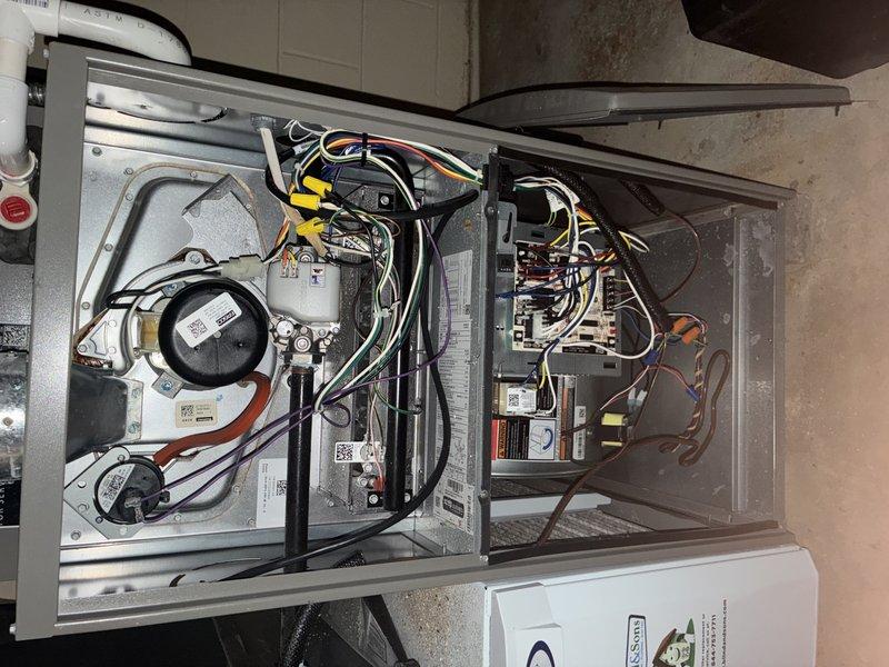 Completed comprehensive MVP furnace maintenance including thorough inspection of all internal components, blower wheel assembly, and electrical systems. Documented blower wheel condition showing minor dust accumulation on blades, examined gas valve assembly, control board connections, and dual blower motors to ensure proper operation. All components photographed and verified to be functioning within normal parameters for continued safe heating system operation.