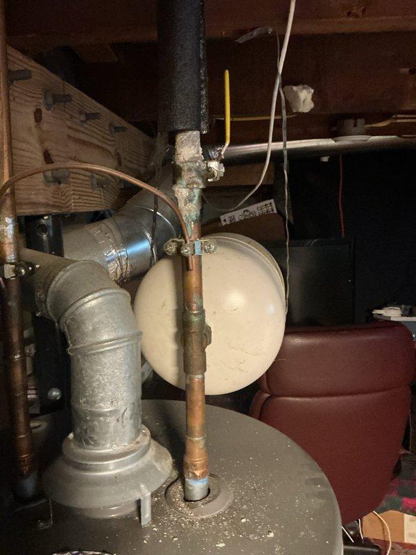 Responded to service call for 38-gallon tanked water heater (manufactured 09/2019) displaying flashing red indicator light signaling thermopile failure with low voltage output. Diagnosed faulty thermopile preventing proper pilot flame detection and main burner operation. Replaced defective thermopile assembly, tested millivolt output to confirm proper voltage generation, and verified gas control valve functionality. Restored water heater to full operational status with all safety controls functioning correctly.